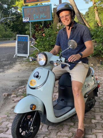 Christo on a sunshine rentals scooter